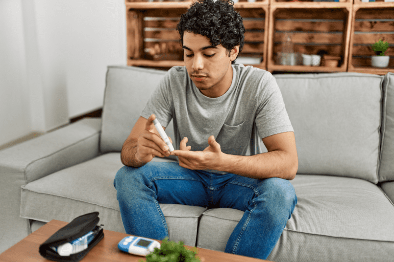 Man Taking his Diabetic Test - AndroNeo Hospitals