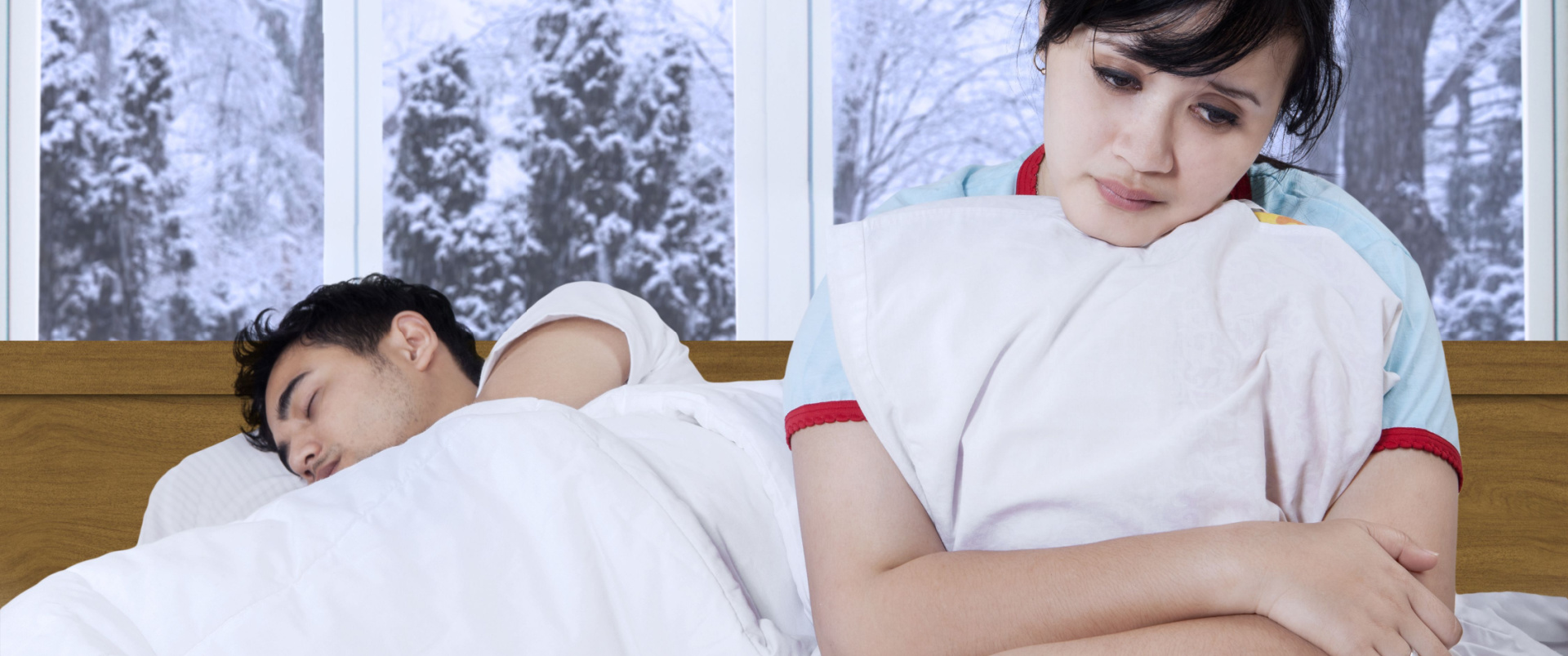 Disappointed Women sitting on bed - AndroNeo Hospital