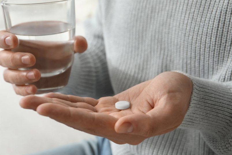 Glass of water and pill - AndroNeo Hospital